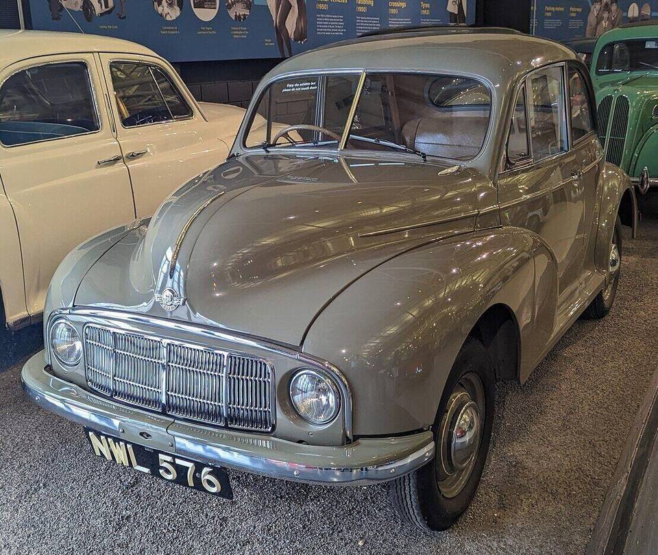 Exact 1948 Morris Minor MM two-door lowlight saloon, with grille-height headlamps visible; not a Tourer or later high-light car.