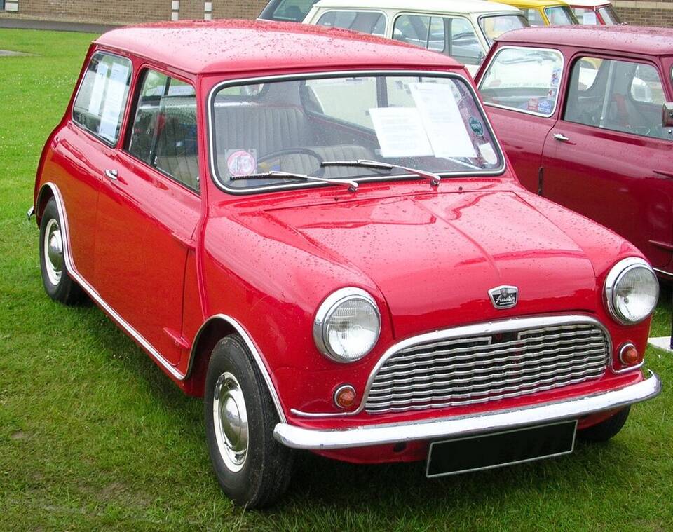 Source identifies the pictured car as a 1959 Austin Seven, matching the launch-year Austin-badged Mini profile.