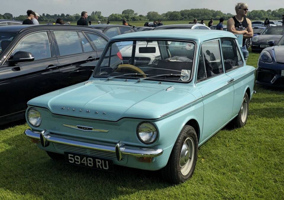 1963 Hillman Imp; visible body and year match, but the source does not establish the De Luxe trim.