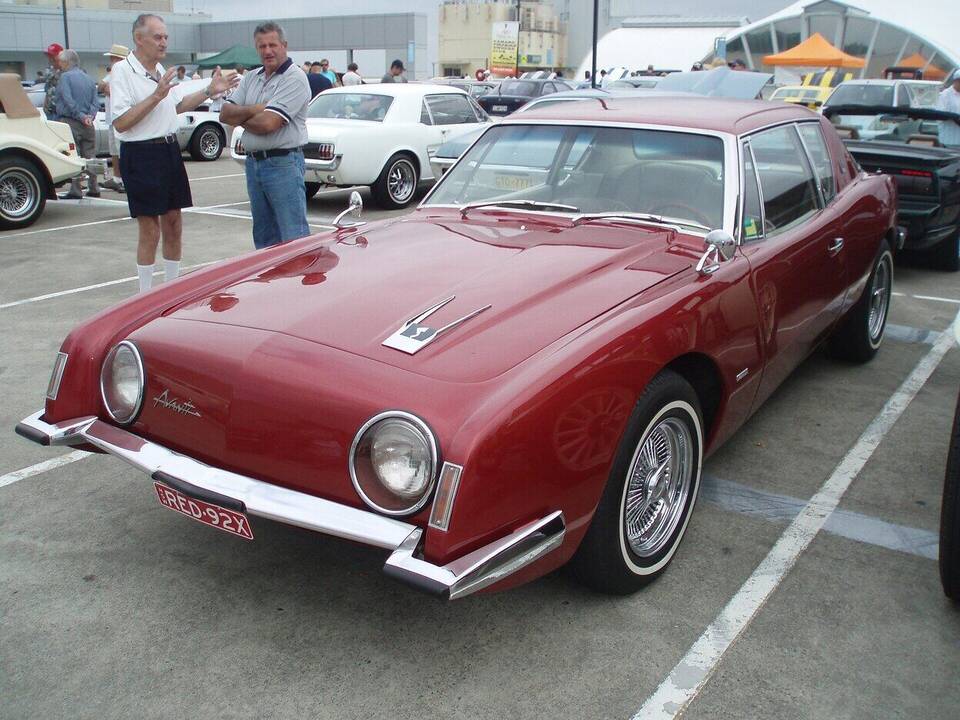 Exact 1963 Studebaker Avanti R2 coupe; supercharger equipment is supported by the source identity but not visible under the closed hood.