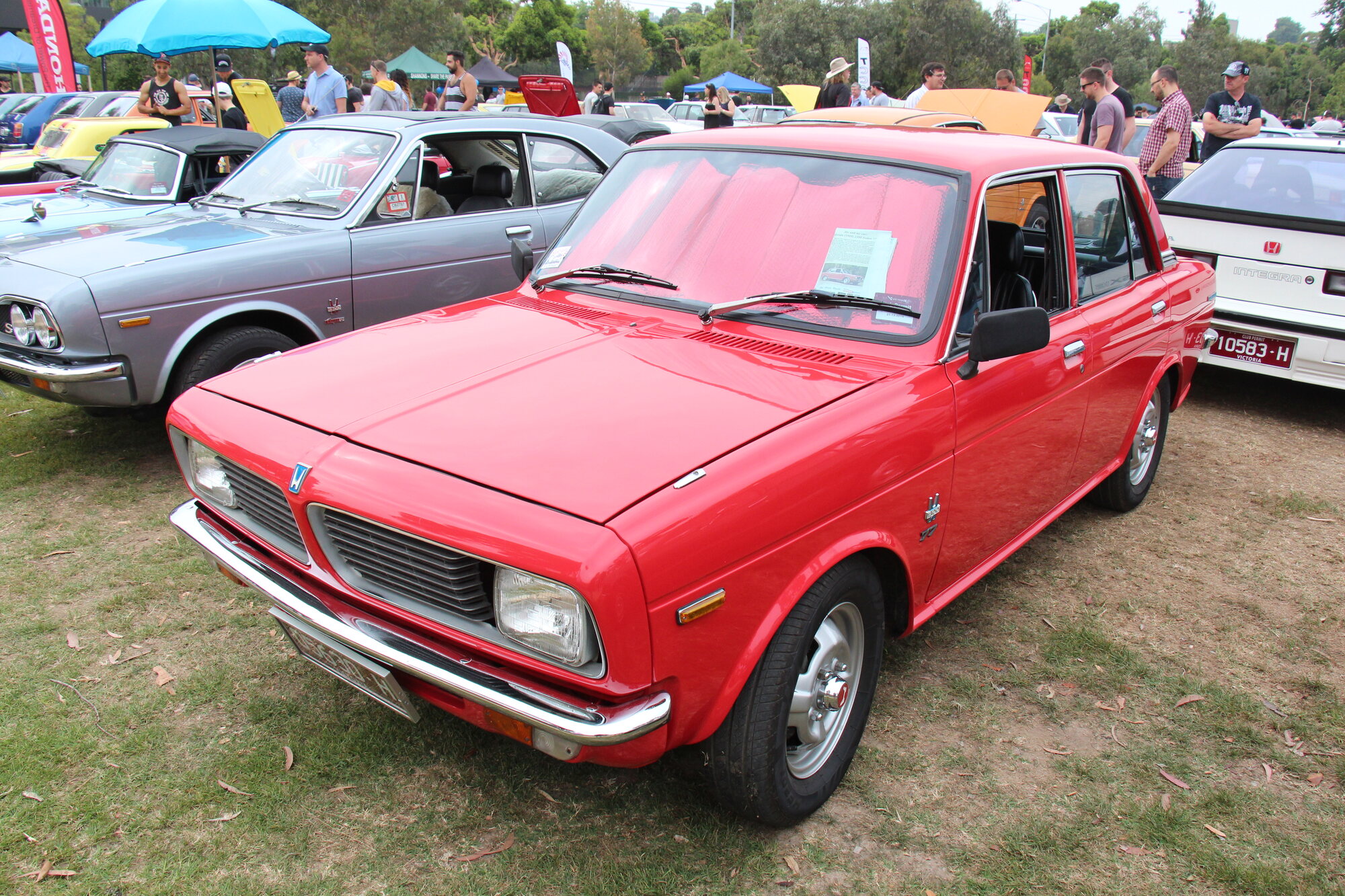 Exact 1969 Honda 1300 Series 77 sedan family; the photograph does not independently establish Deluxe trim or transmission.
