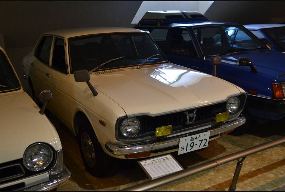 Exact 1972 A22 four-door 1400 sedan, but Custom trim rather than DL; representative trim is disclosed.