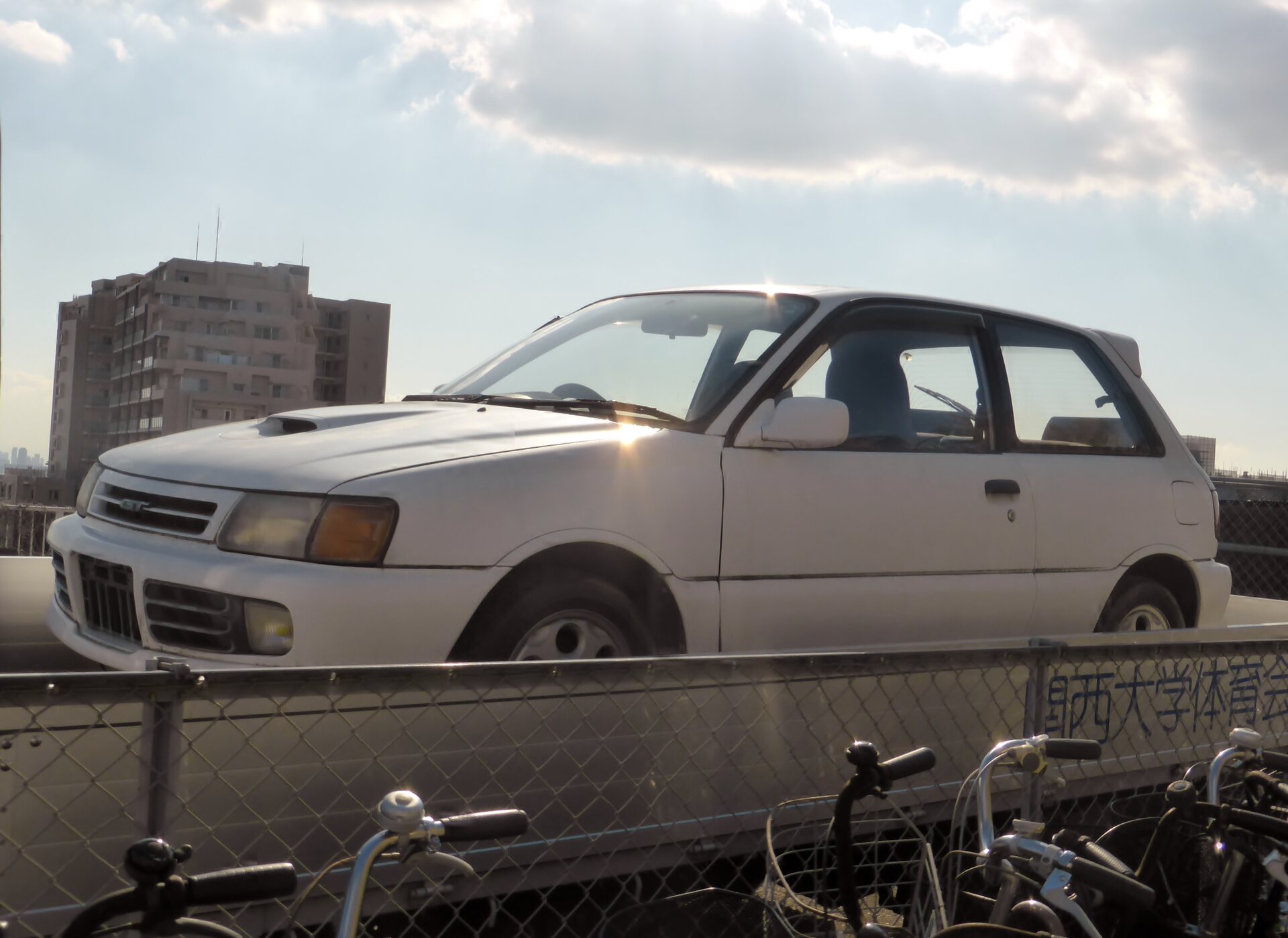 Exact EP82 Starlet GT Turbo identity in Japan; photographed in 2013 and the car's model year is unverified. Representative of the 1990 profile, not exact-year proof.