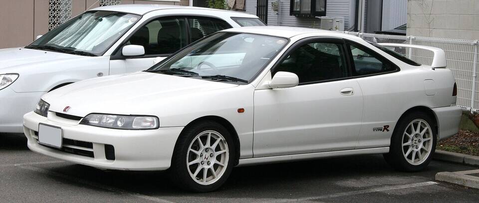 Commons identifies a Honda Integra Type-R DC2. The image is an exact body and trim match, while the page does not independently establish 1995 production.