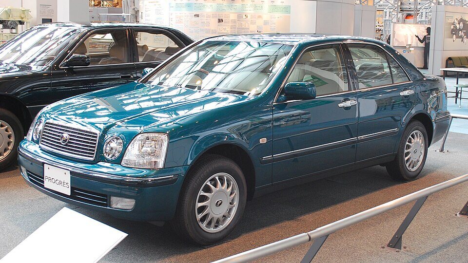 Early May 1998-April 2001 Toyota Progrès body; NC300/base-grade identity is not visually confirmed and must be labeled representative.