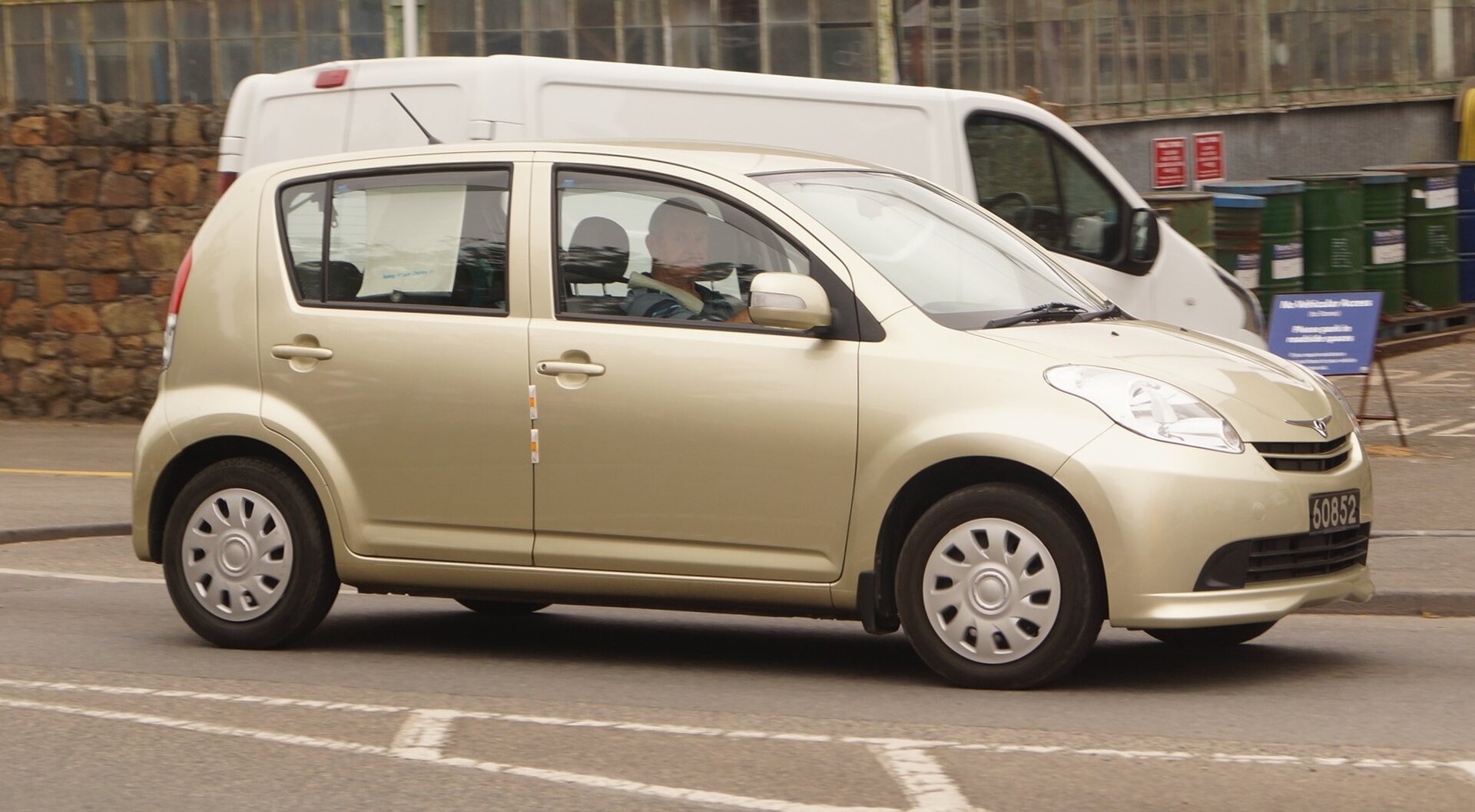 First-generation 2005-2011 Myvi photographed in Guernsey in 2016. Exact year, 1.3 EZi trim, transmission, and Malaysian-market equipment are not established.