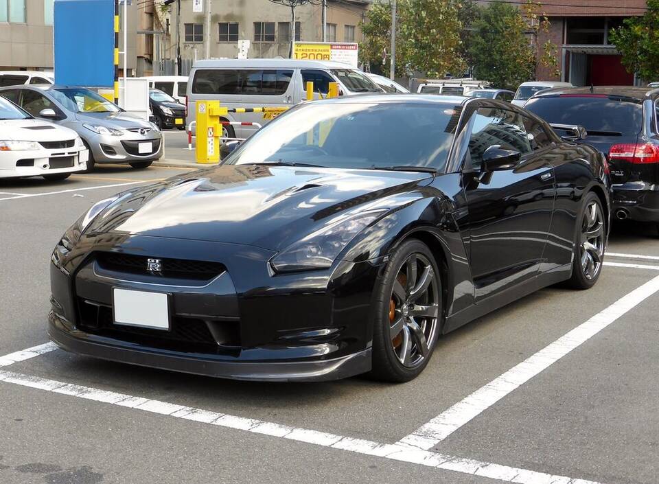 Commons identifies a 2009 Nissan GT-R, chassis CBA-R35. The source does not establish U.S.-market Premium trim, and the photographed car may carry non-stock wheels or lower-body pieces.