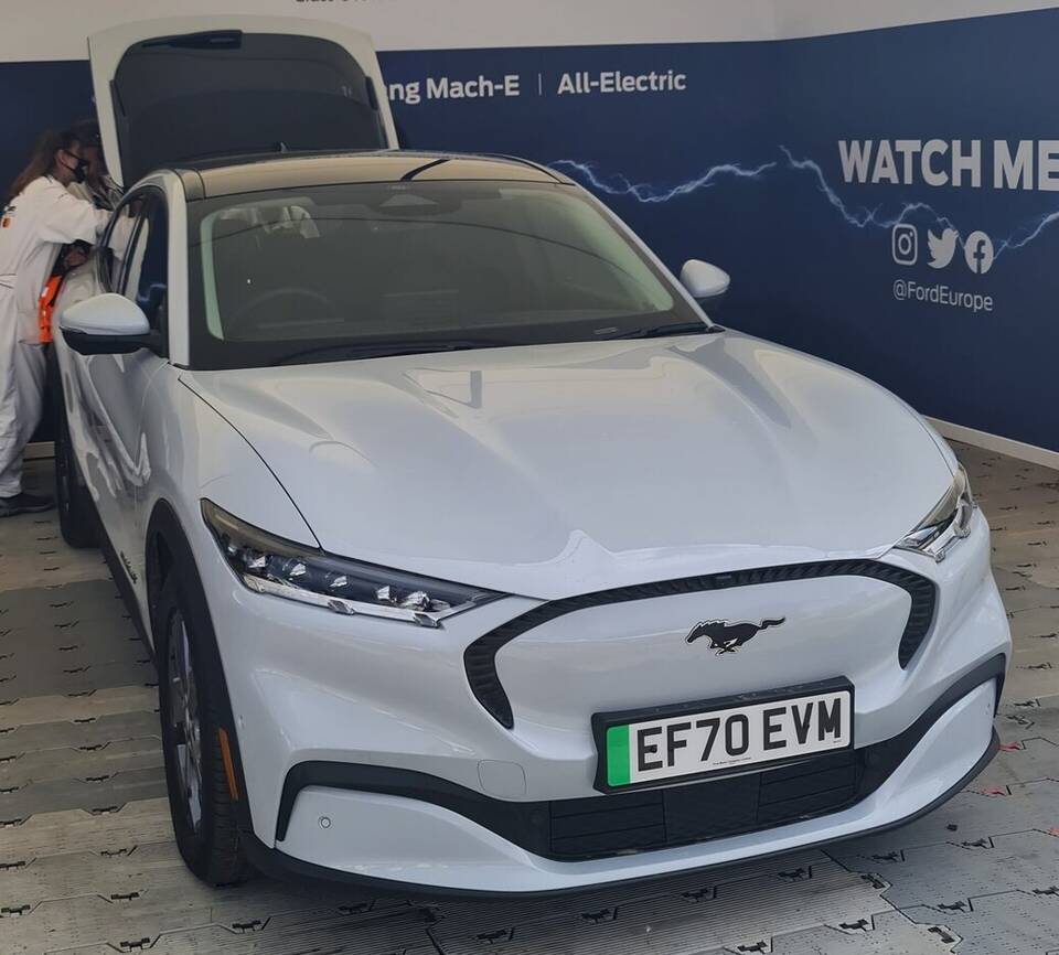 Exact 2021 Mach-E with Extended Range battery, but UK-market rear-wheel drive rather than the profile’s U.S. Premium eAWD specification; drivetrain and market difference explicit.