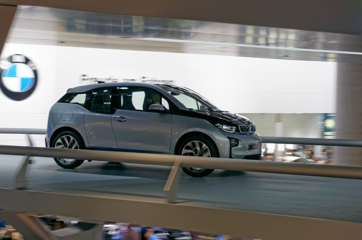 The source identifies the production-version BMW i3 displayed at the 2013 Frankfurt Motor Show. It does not independently establish battery-electric versus range-extender configuration, battery capacity or market specification.