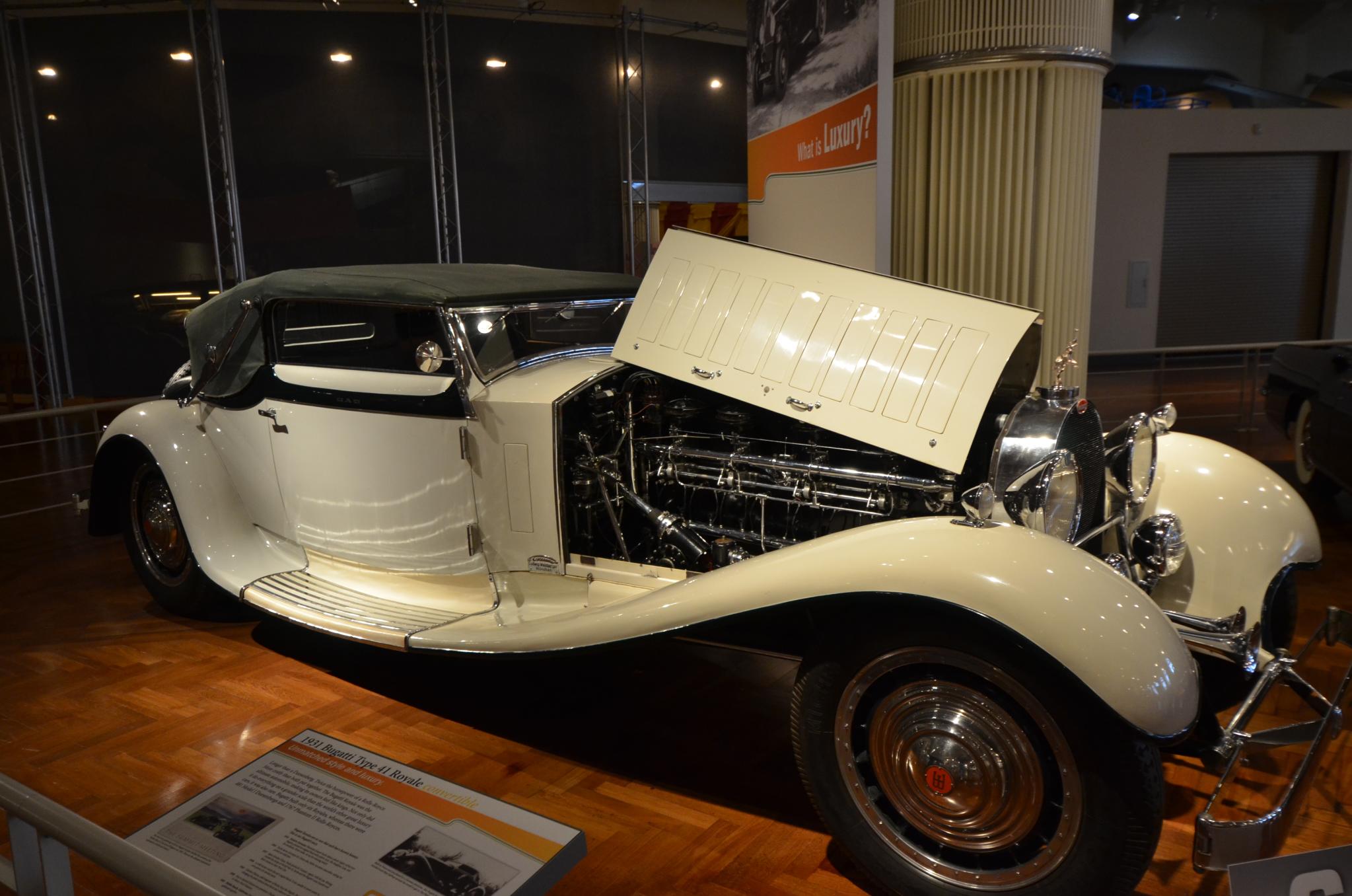 White 1931 Bugatti Type 41 Royale convertible chassis 41121 displayed at The Henry Ford with its long hood raised over the inline-eight engine.