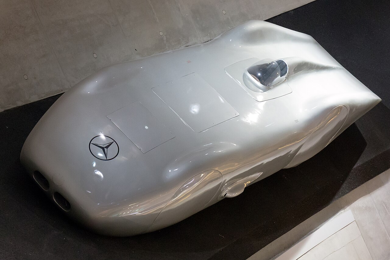 Silver streamlined 1938 Mercedes-Benz W 125 record car viewed from above at the Mercedes-Benz Museum.