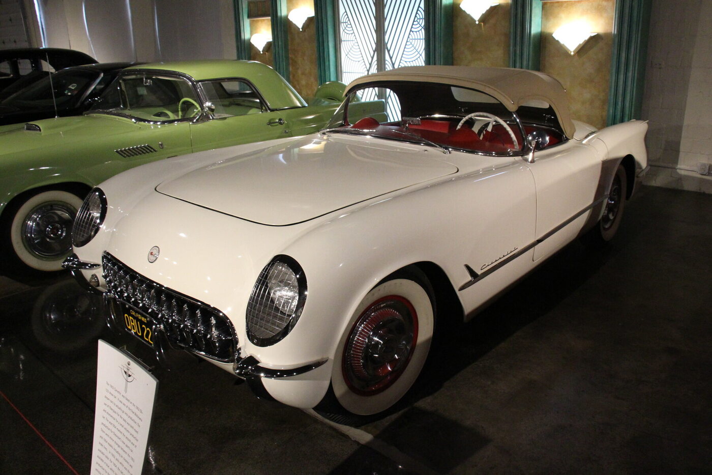 The source identifies an exact 1953 first-year Corvette roadster in Polo White with a red interior, matching the profiled U.S. production specification. Restoration originality is not proved by the image.