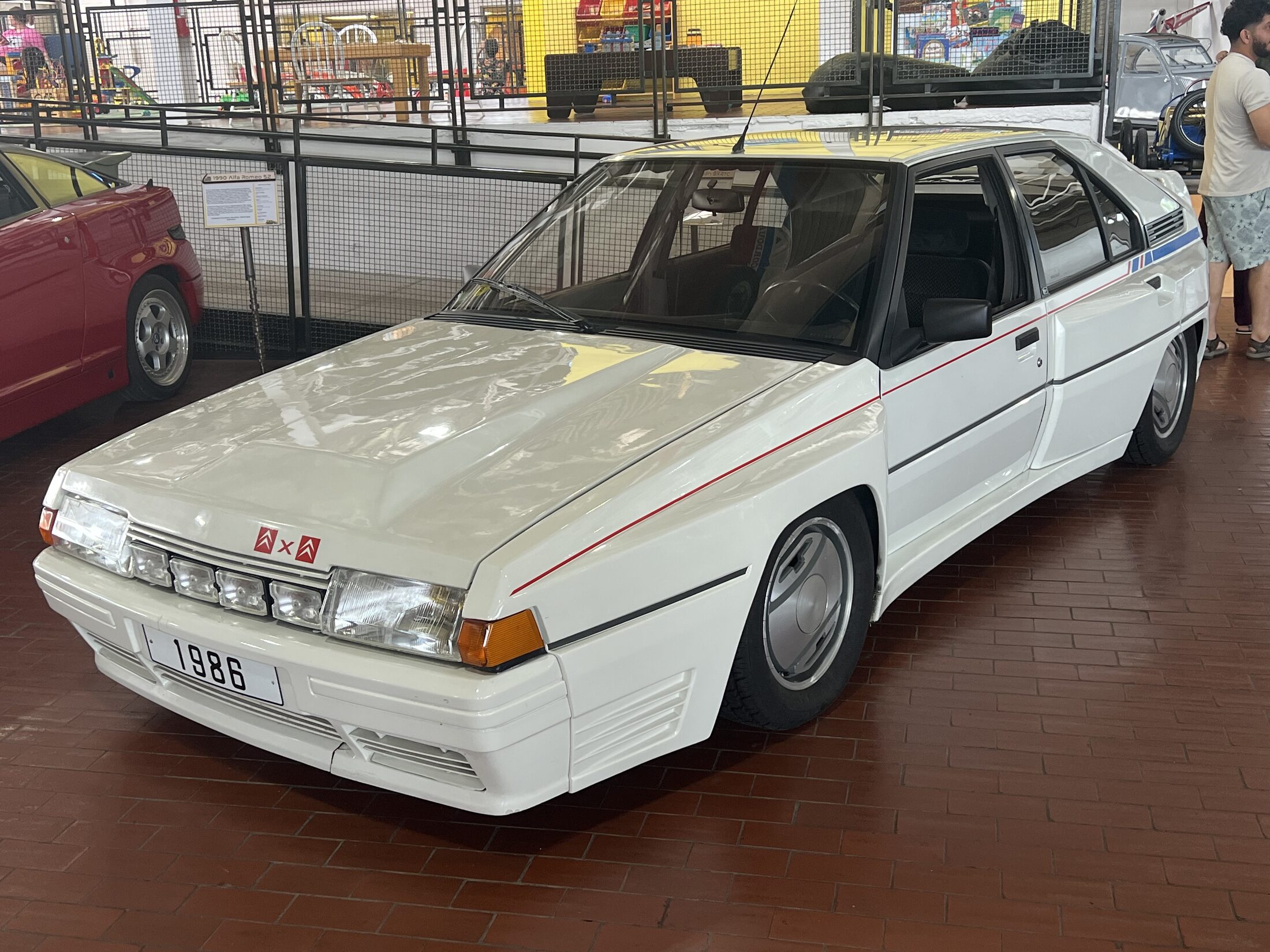 Commons title and description explicitly identify a 1986 BX 4TC; museum display is the road-going homologation car, not the winged Evolution rally car.
