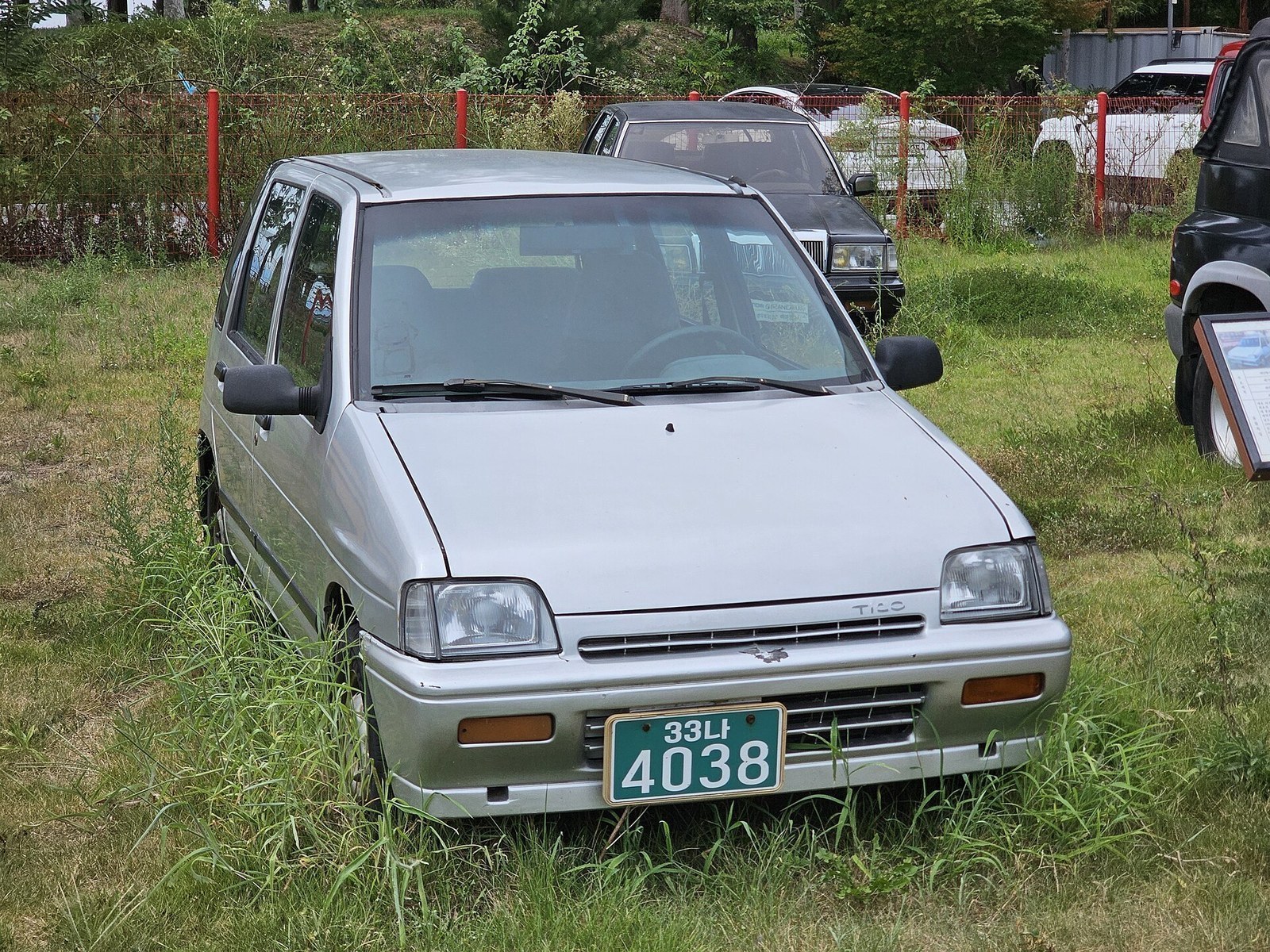 Source title identifies a 1991 Daewoo Tico DX, matching corrected launch identity, year, model, and trim.
