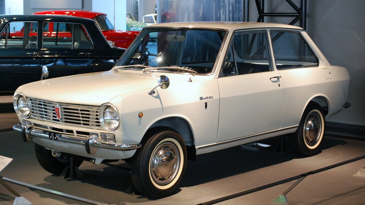 The source identifies a 1966 first-generation Datsun Sunny B10.