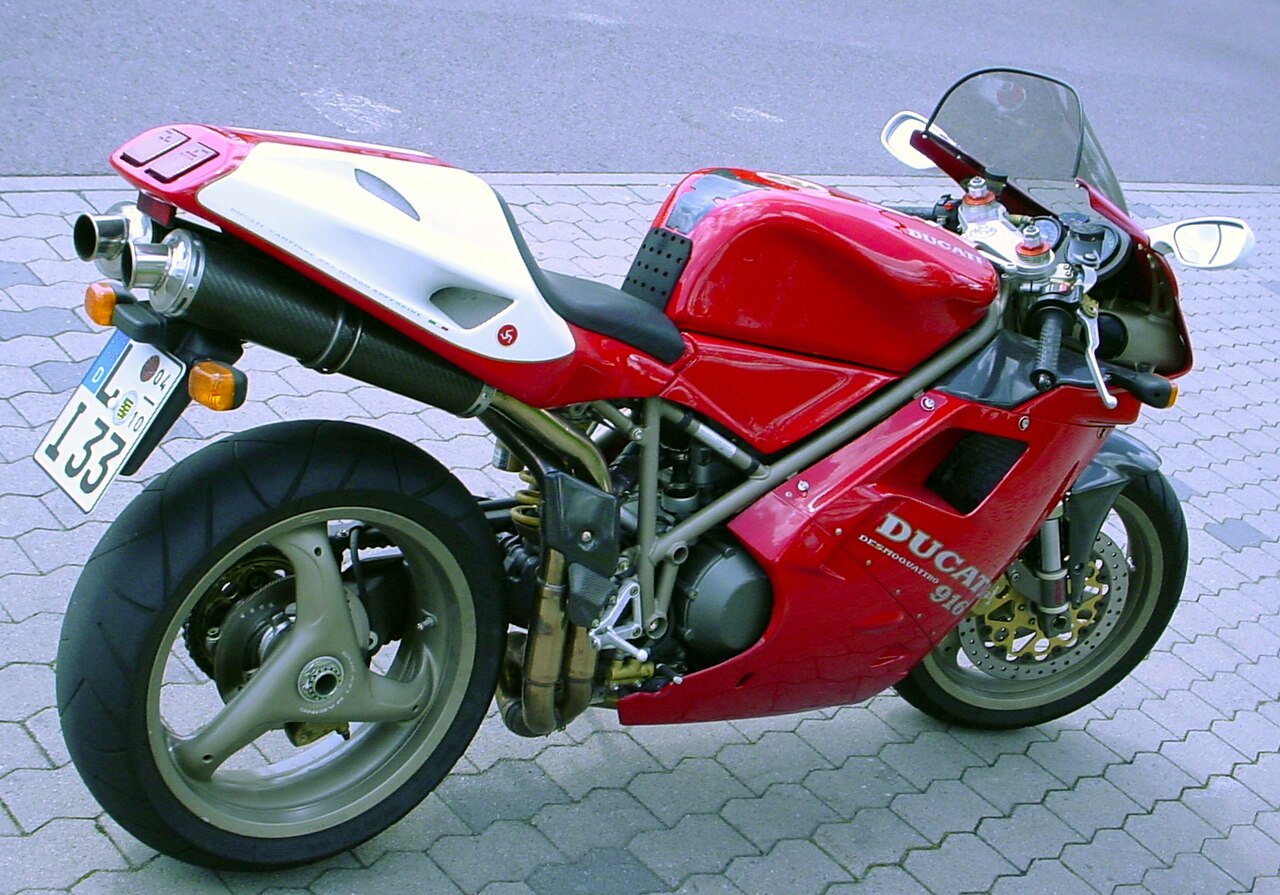 Representative Ducati 916; exact year, market and trim are unverified. Visible equipment is not proof of original 1994 specification.