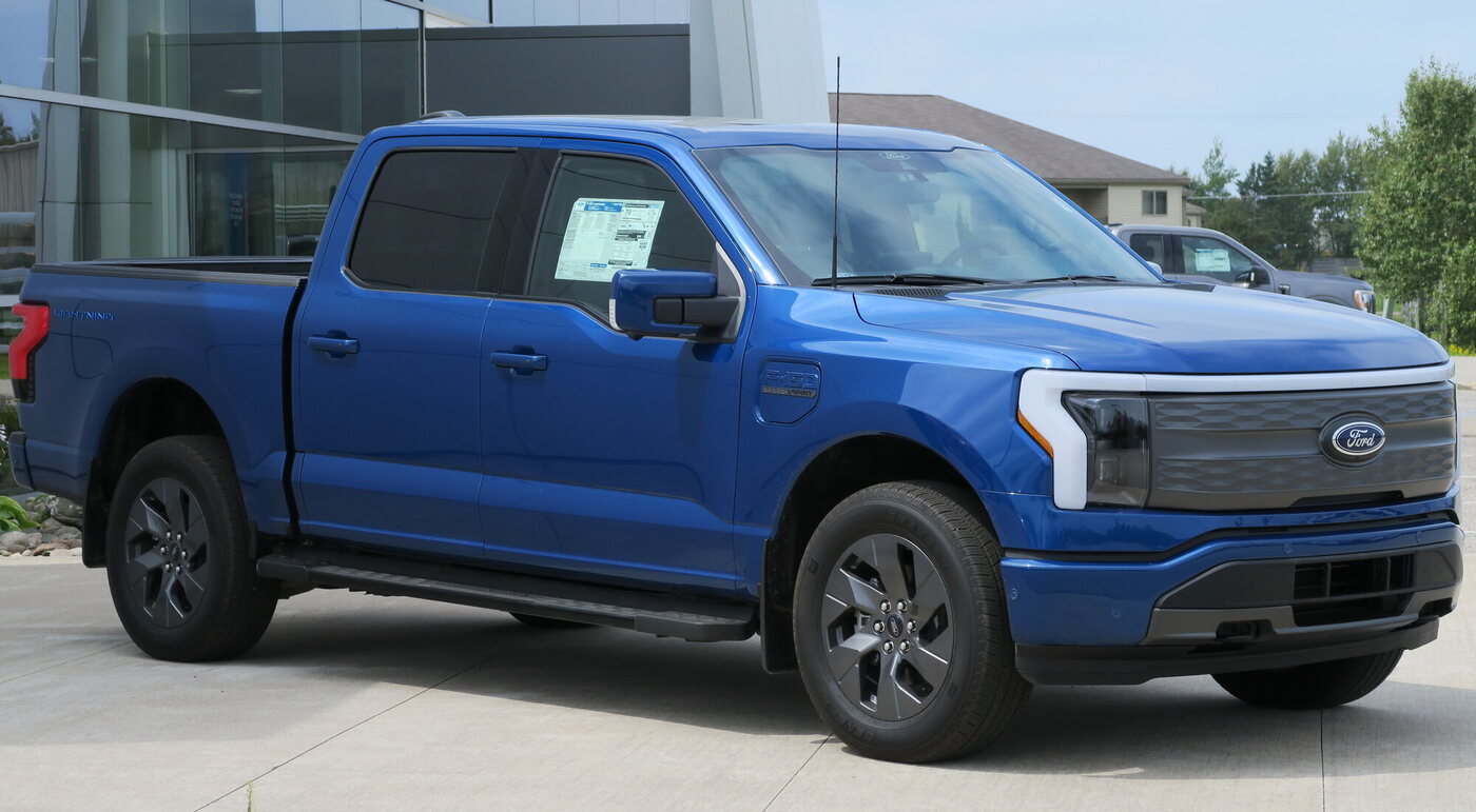 Exact 2022 F-150 Lightning family, but the photo is Lariat trim while profile specifications are Pro standard-range.