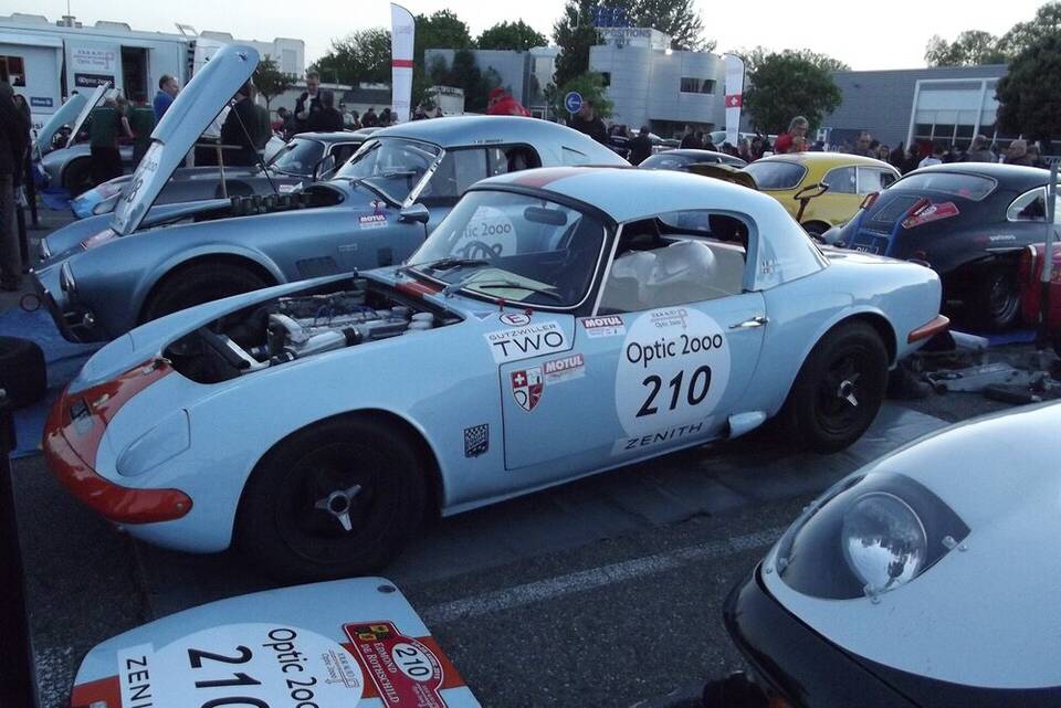 Commons identifies a 1964 Lotus Elan roadster. It is the Type 26 body family and a better visual match than the rejected coupe lead, but it is competition-prepared and not the 1962 launch car.