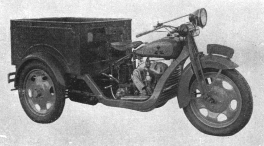 Commons identifies the three-wheel vehicle as a Mazda-Go Type-DA and credits a 1950 Toyo Kogyo company-history book. The period photograph supports the exact model identity; restoration or surviving-vehicle condition is not implied.