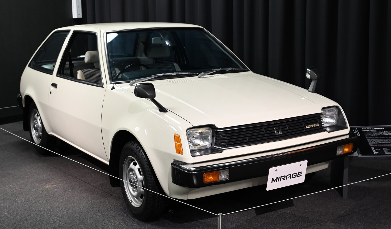 Exact 1978 Mitsubishi Mirage 1400 GLX three-door displayed at the Mitsubishi Auto Gallery; individual restoration originality is not established.
