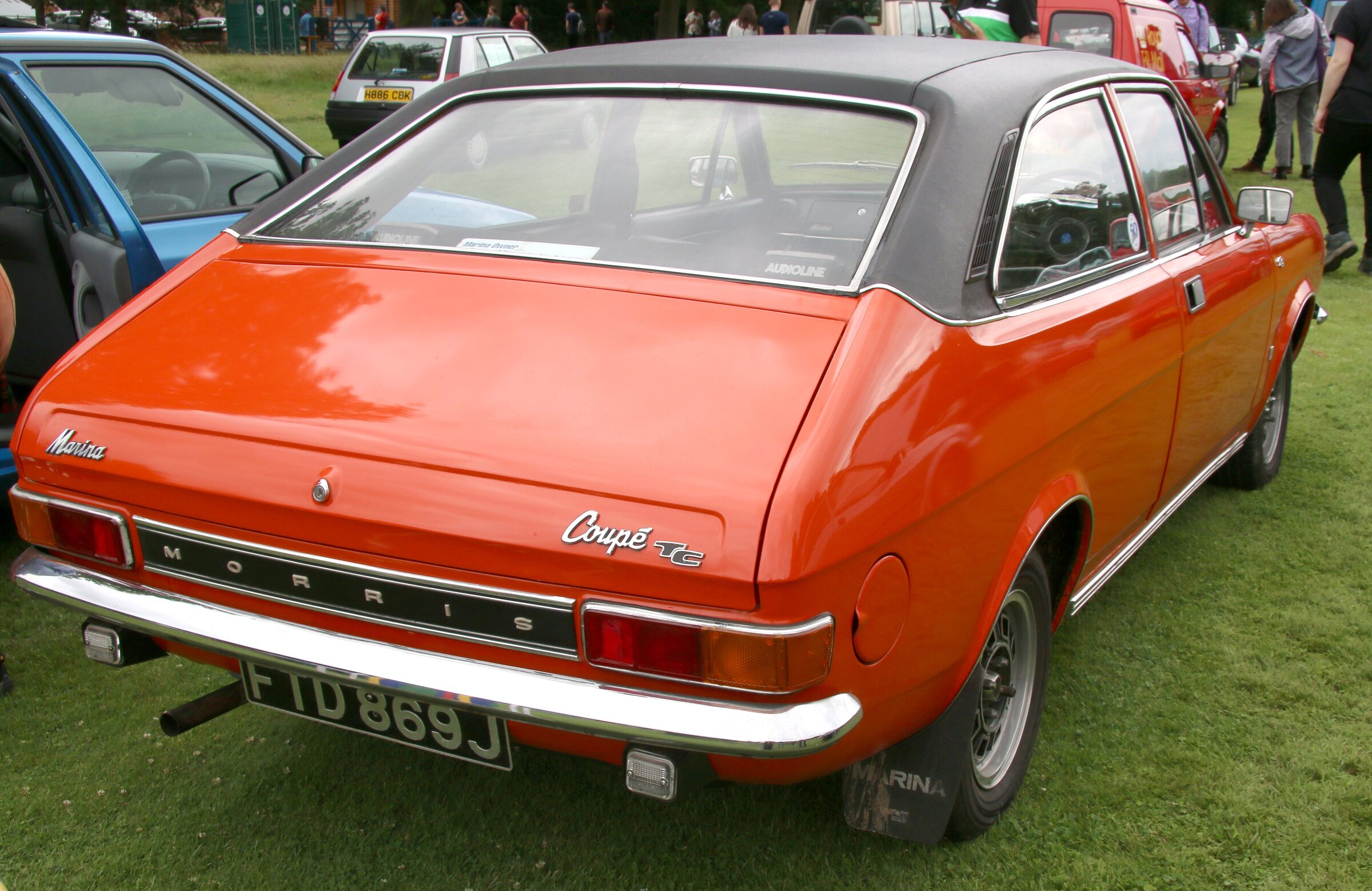 Exact documented 1971 Morris Marina 1.8 TC Coupe. The TC badge and 1971 UK registration are visible; exact build month and untouched factory specification remain unproved.
