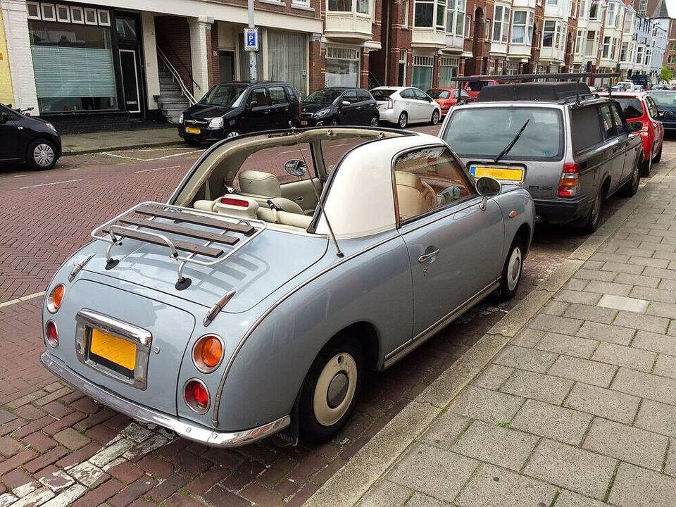 1991 Japanese-specification Nissan Figaro FK10 shown as an imported car in the Netherlands
