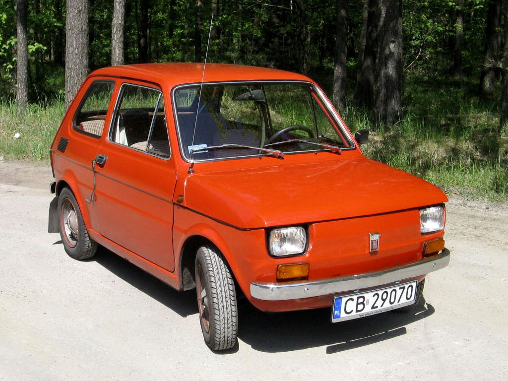 The Commons source identifies a 1973 Polski Fiat 126p survivor; this matches the profile's year and early 600 identity, but restoration originality is not established.