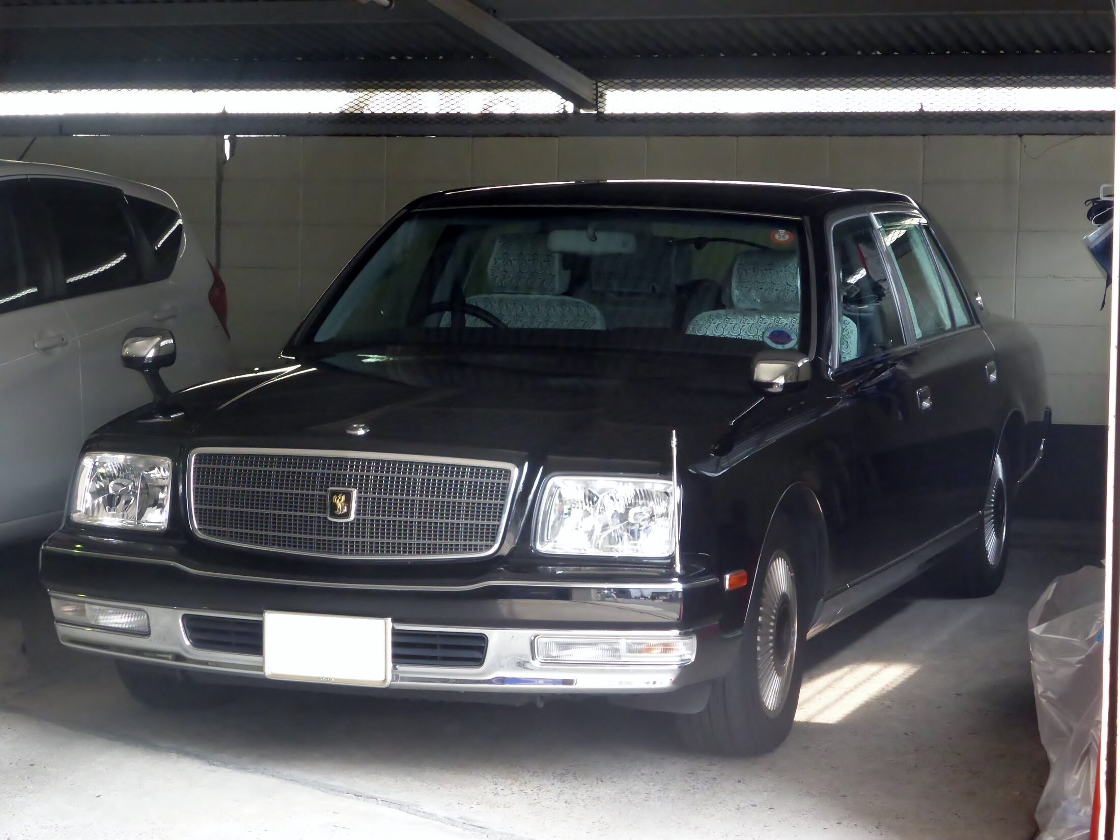 Exact unmodified GZG50 Century identity; source does not state the photographed car's model year or prove a 1997 launch example.
