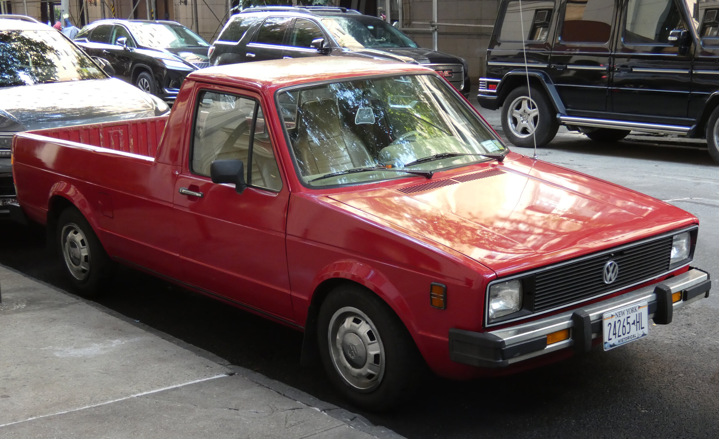 Exact 1980 U.S. Volkswagen Rabbit Diesel Pickup with the U.S. bumper and first-year pickup body; the source notes that the red paint is likely non-standard and the profile preserves that caveat.